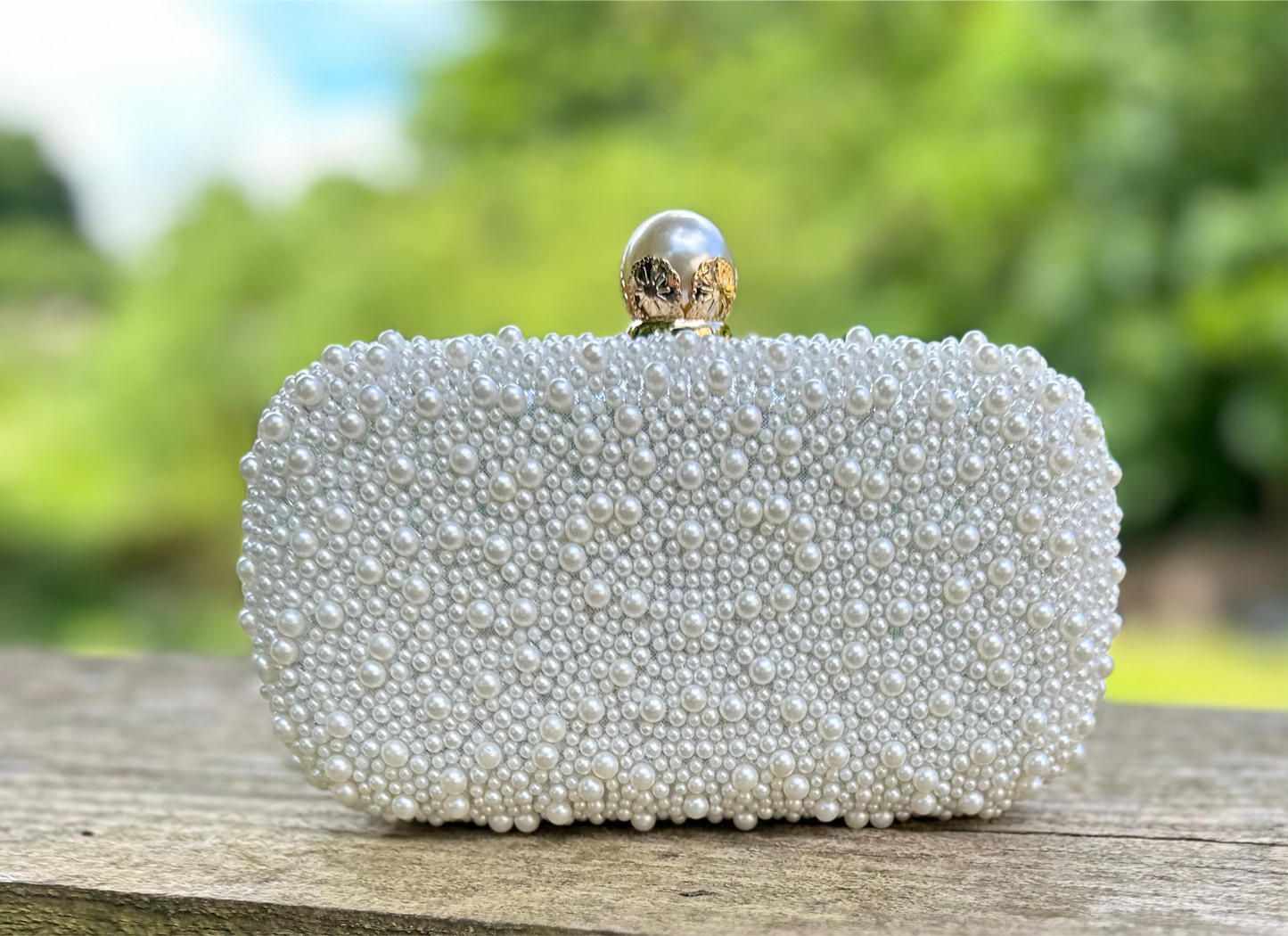 Plain pearl clutch bag